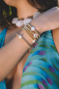 THE GABRIELLE 14K YELLOW GOLD FILLED BRACELET WITH PEARL ACCENTS